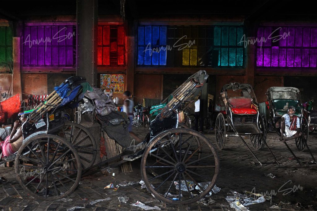 13 Rickshaw Pullers Waiting in the Stand Close to Howrah Bridge, 2016